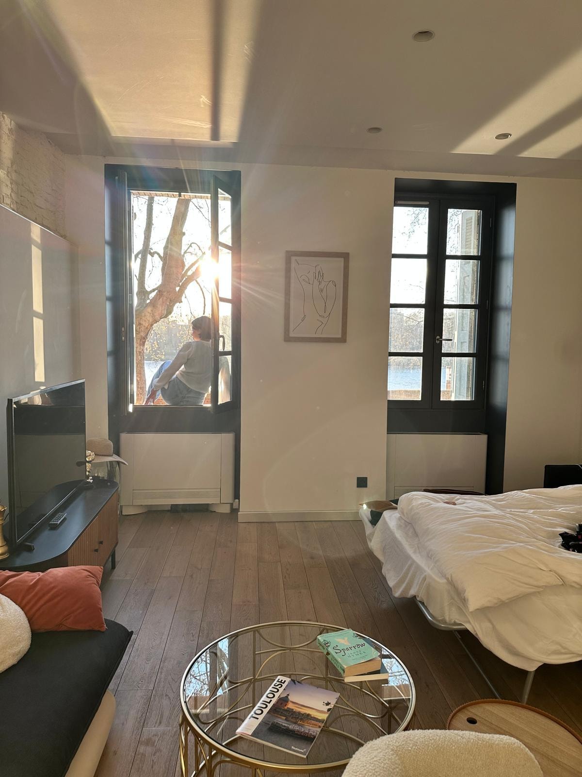 The lovely river views and amazing high ceilings!