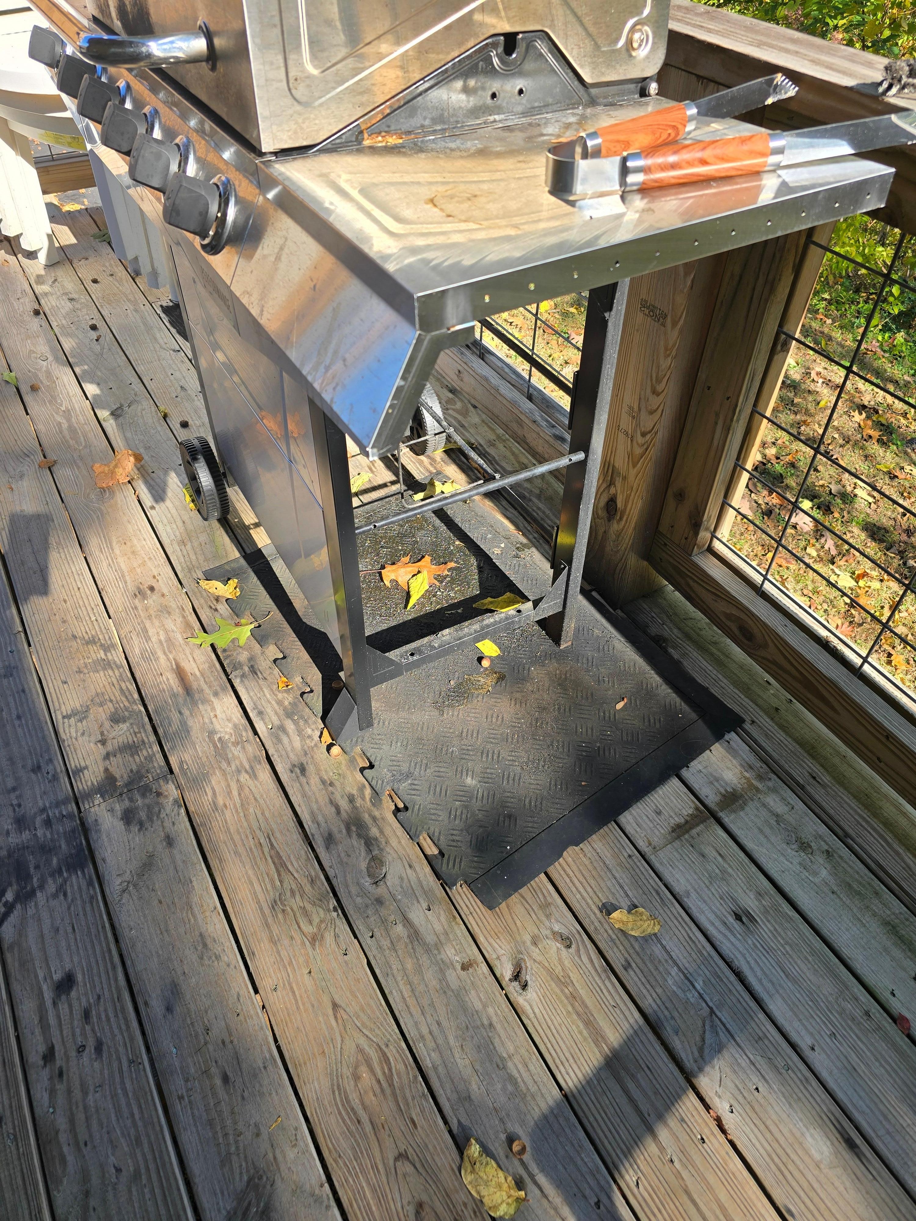 Porch area around grill was covered in grease and stains. The theme carries through inside as well. 