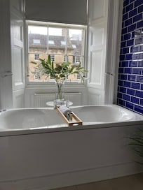 Bathroom is big and bright.