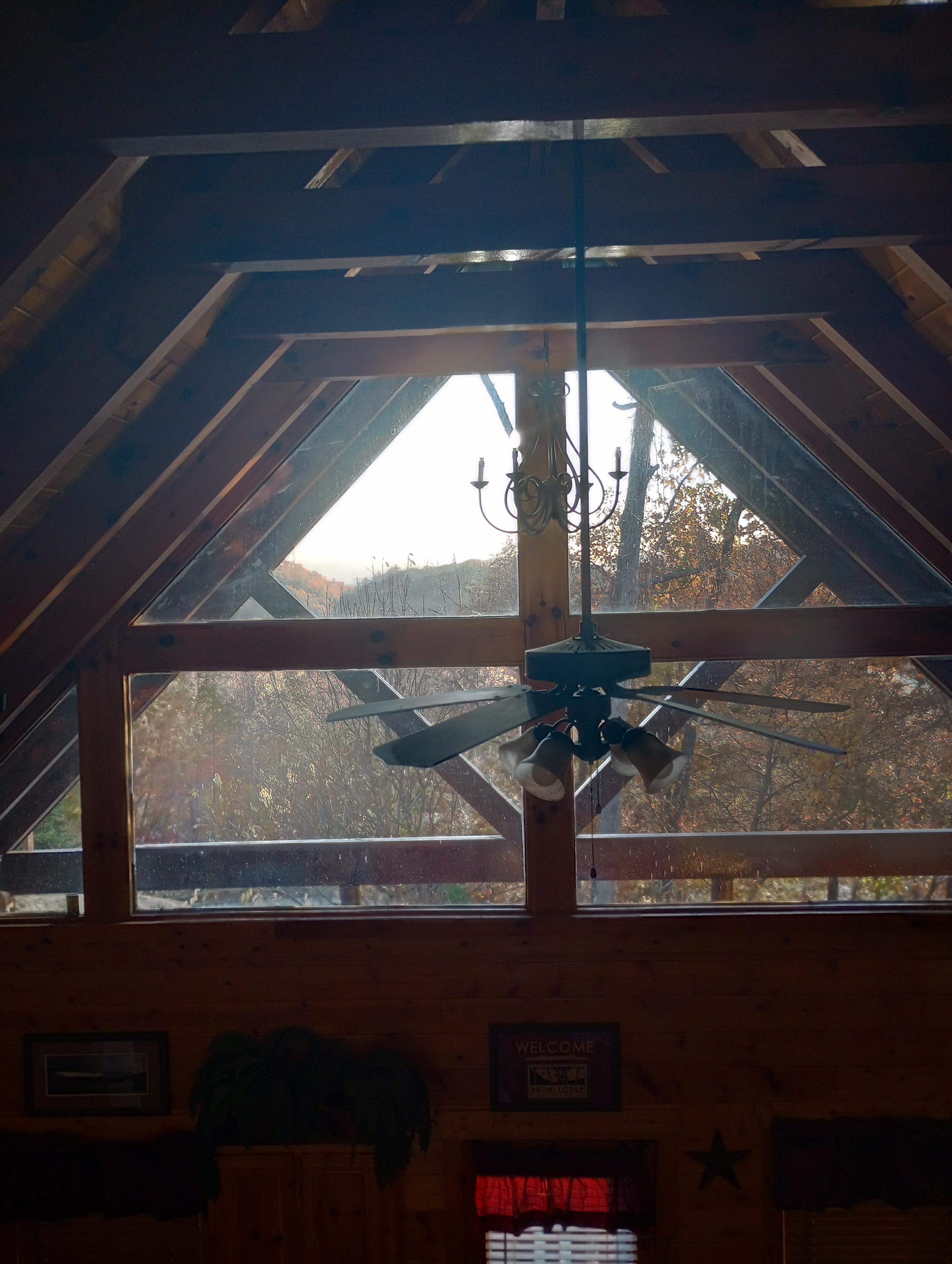 Looking out the window on the front of the cabin from the upstairs bedroom.