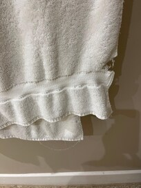 Ripped towel , hanging threads in a superior room!
