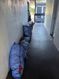 Dirty laundry strewn in the hallway