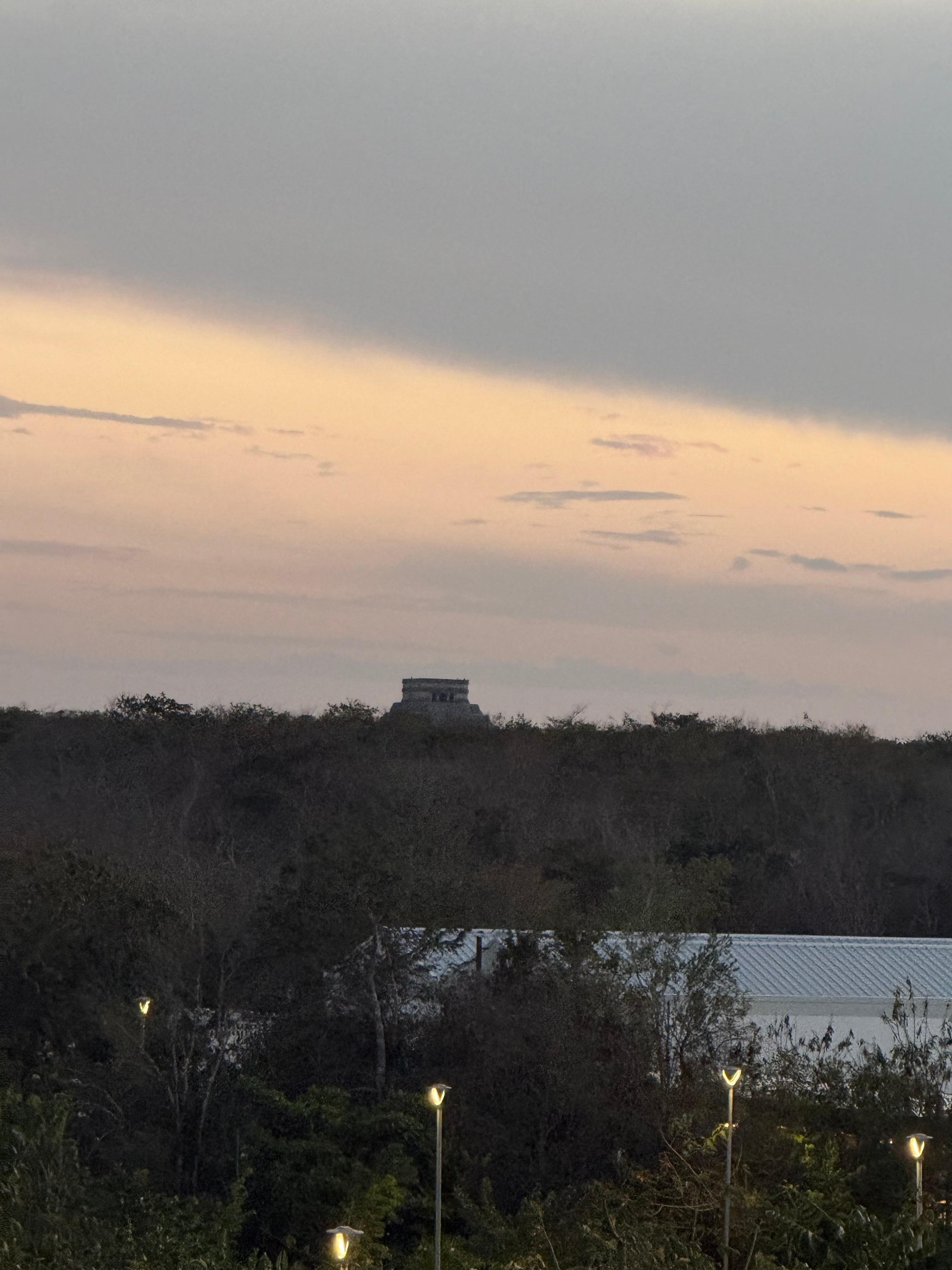 An evening view from the hallway with Chichen Itza in the background. The hotel is less than a 10 minute drive to Chichen Itza.