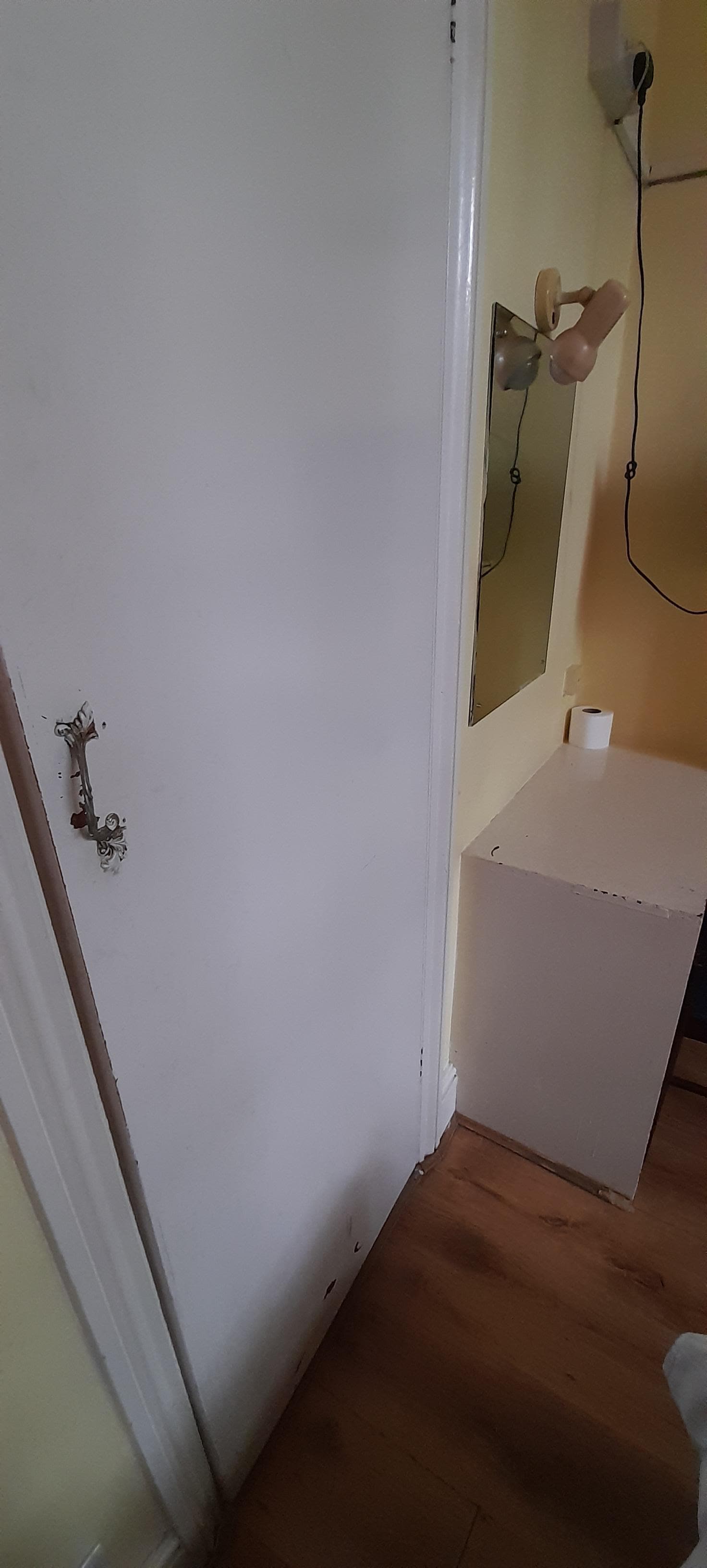 Handle hanging off the wardrobe