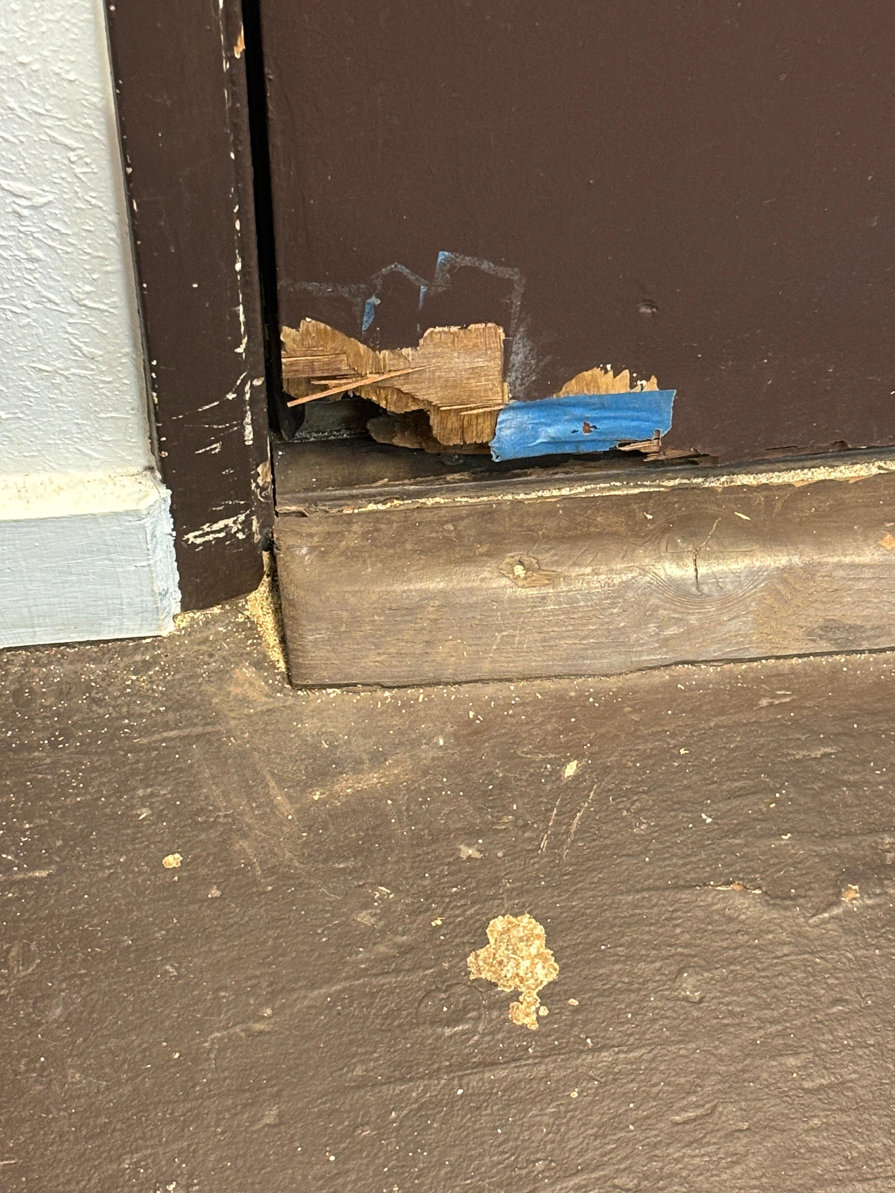 Hole in the corner of the front door