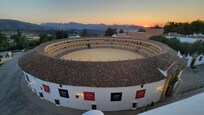 Sicht vom Dachrestaurant auf die Stierkampfarena bei Sonnenuntergang
