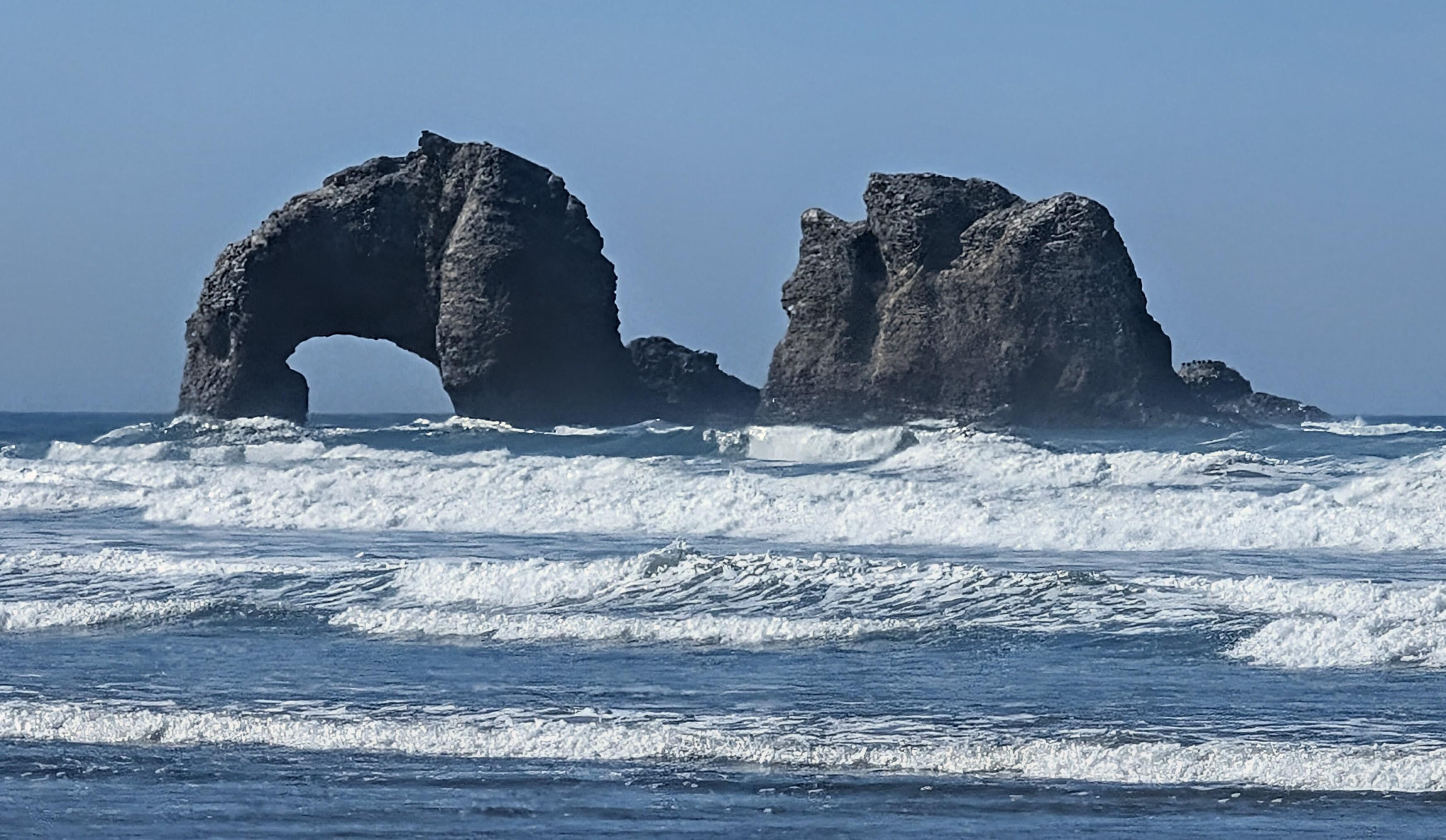 Twin Rocks at High Tide Surf