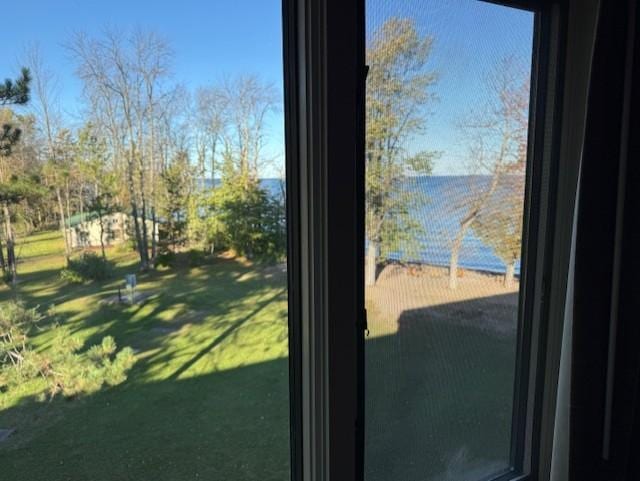 To see this view, you have to stand at the window and look toward the lake.  From inside the room, you only see the neighbor's property.