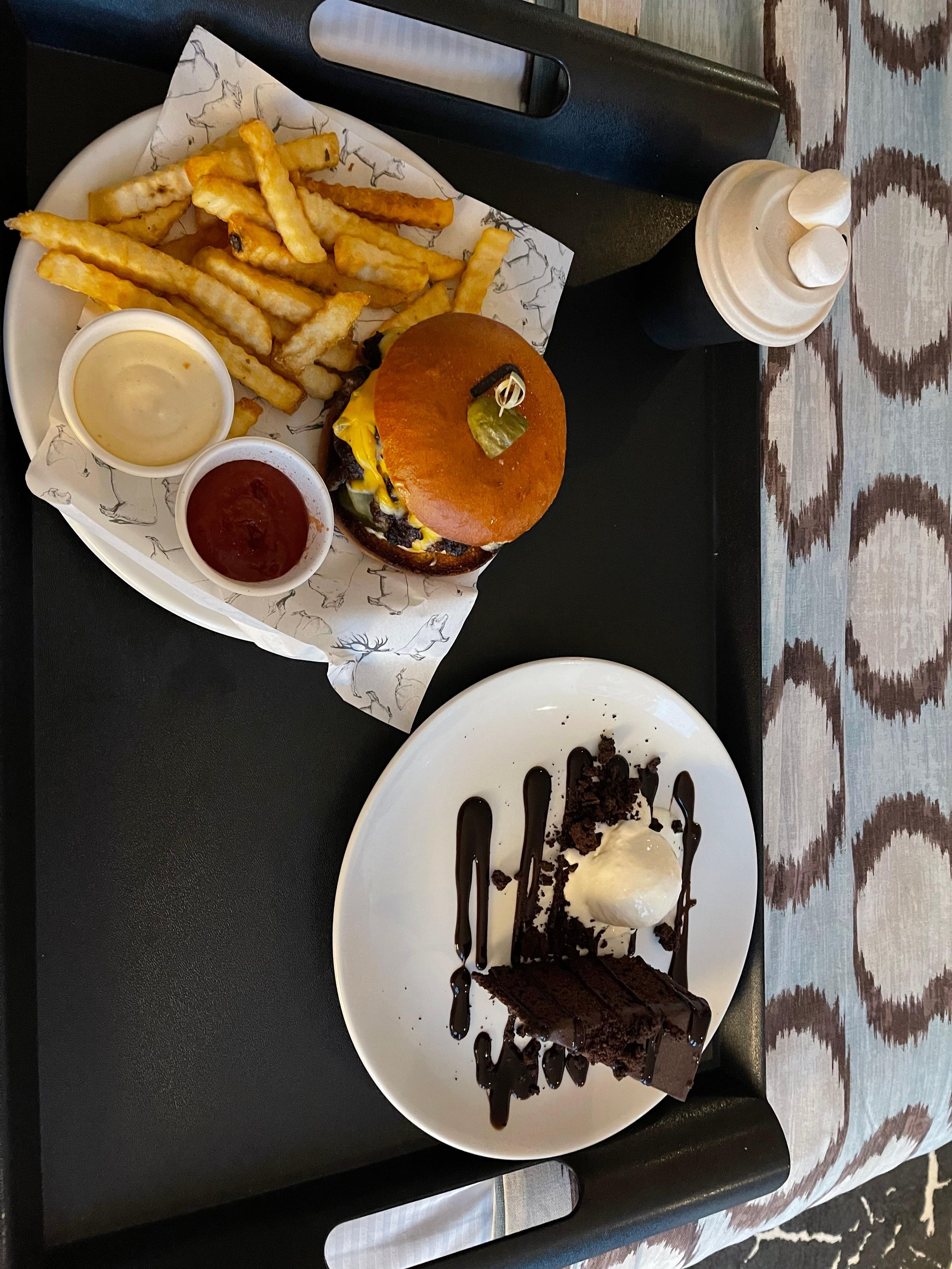 Room service meal 💗 cheeseburger (totally recommend), chocolate cake, & soy milk hot chocolate. 