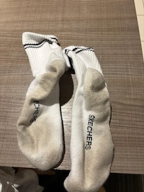 proof of a dirty carpet and sticky floors: walked around the hotel room for like 30 minutes with just my socks on and look how dirty my socks got!