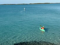Paddle boarding and kayaking right out back.