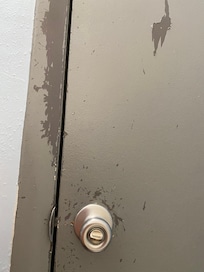 Bathroom door from the inside. Paint pealing