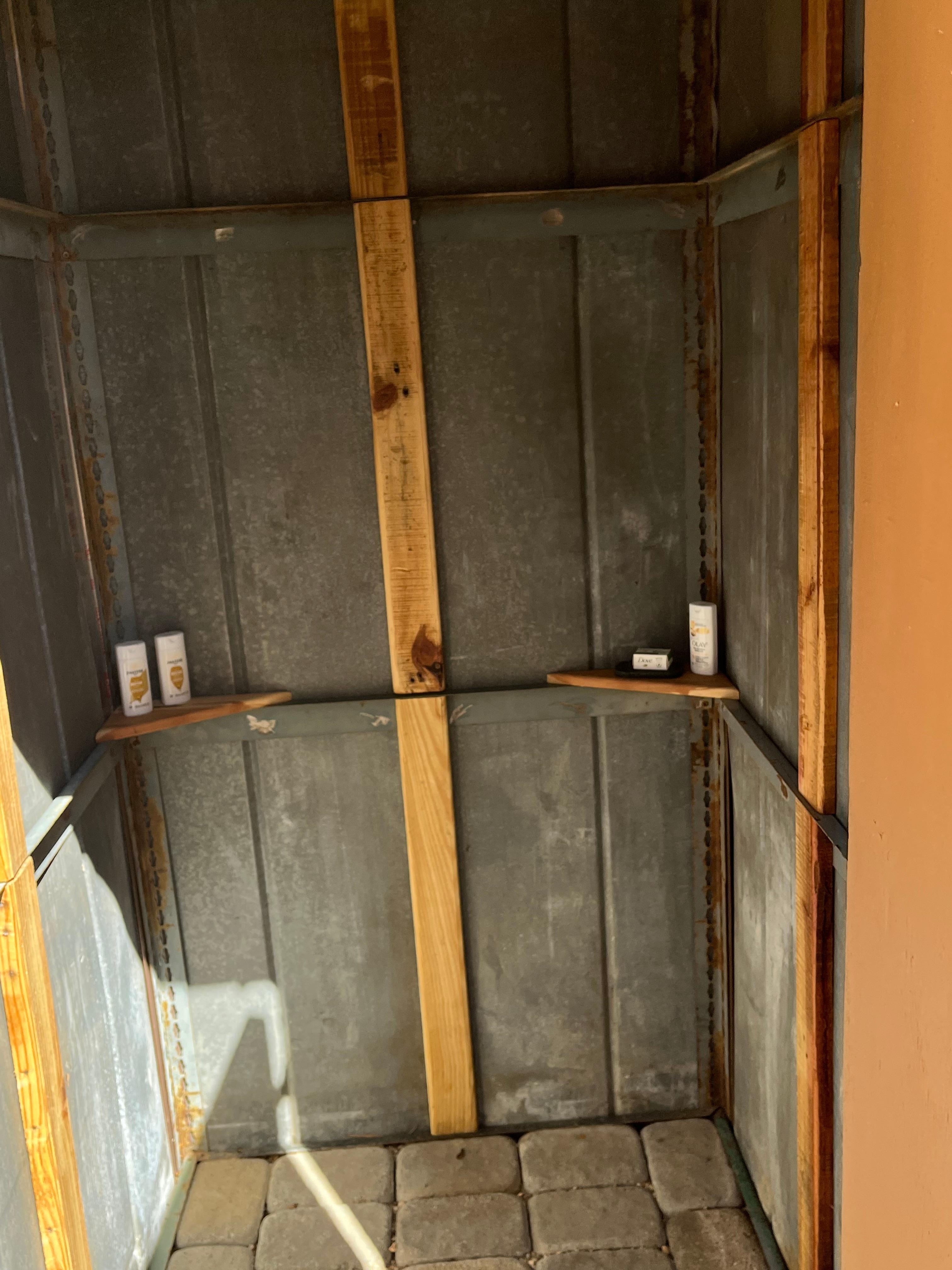 Shower put Jug water over you’re head on shelf