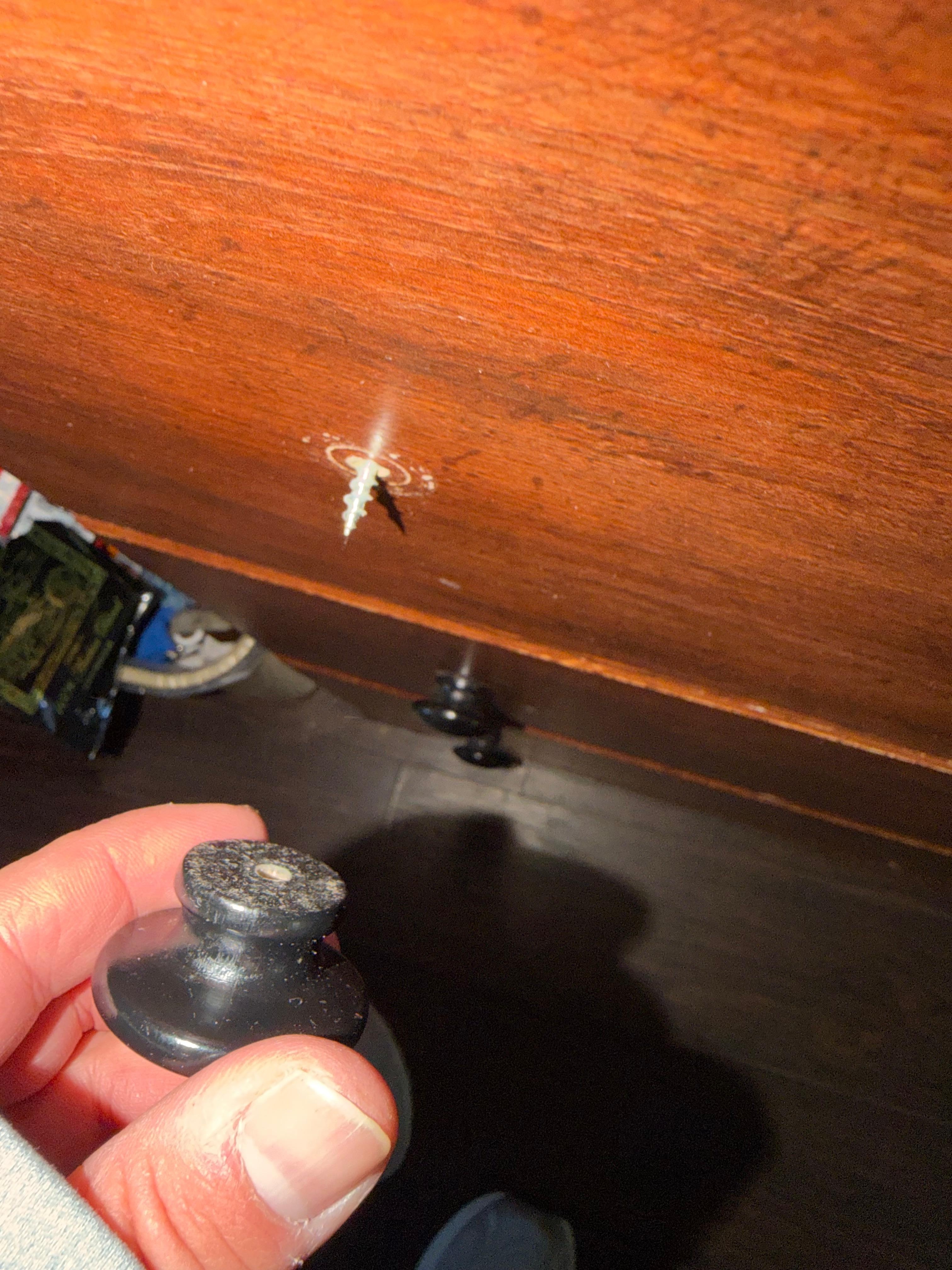 I tried opening the drawer and almost stabbed myself on the broken drawer knob 