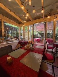 Their dining food area , with an outside patio