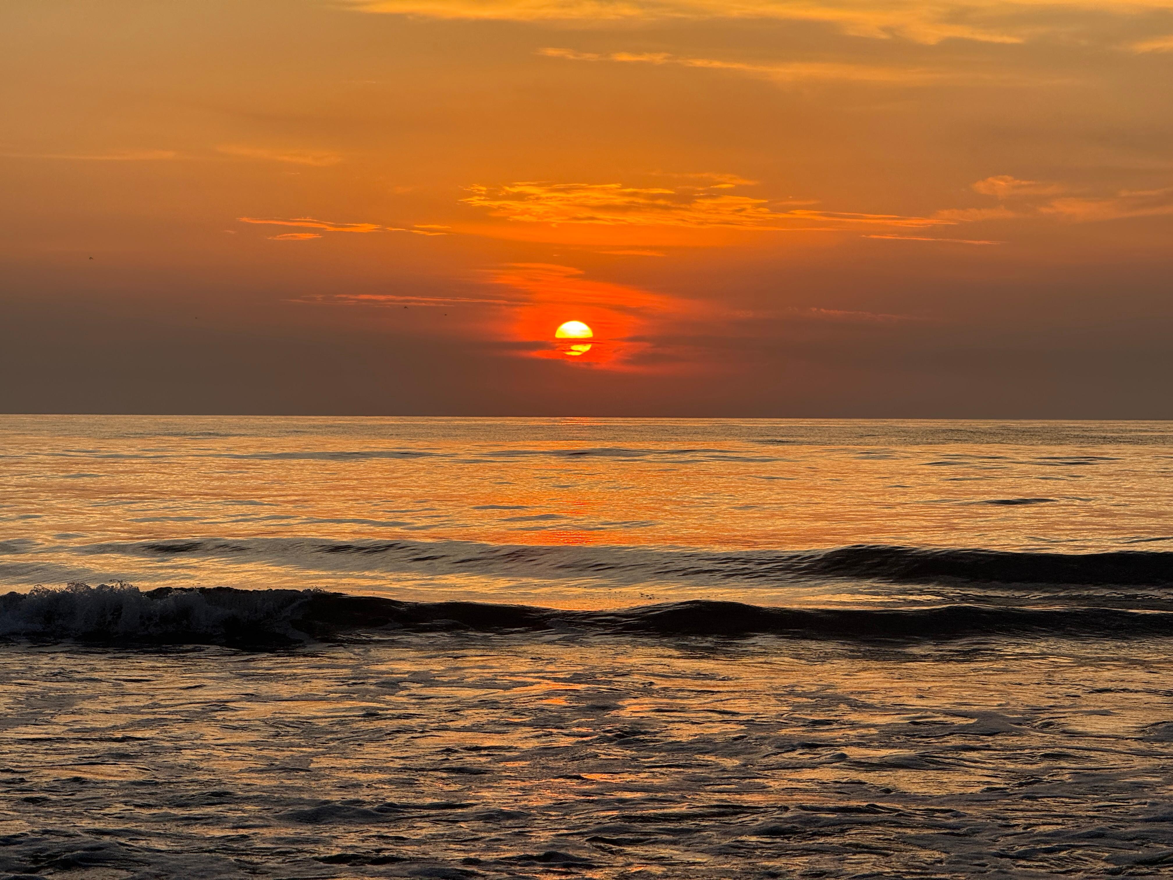 Sunrise just steps away from the property on the beach!!!