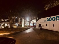 Tour bus stock at the only entrance to this “hotel”