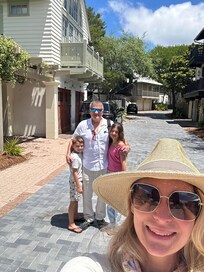Pic of us and the carriage house in the back!