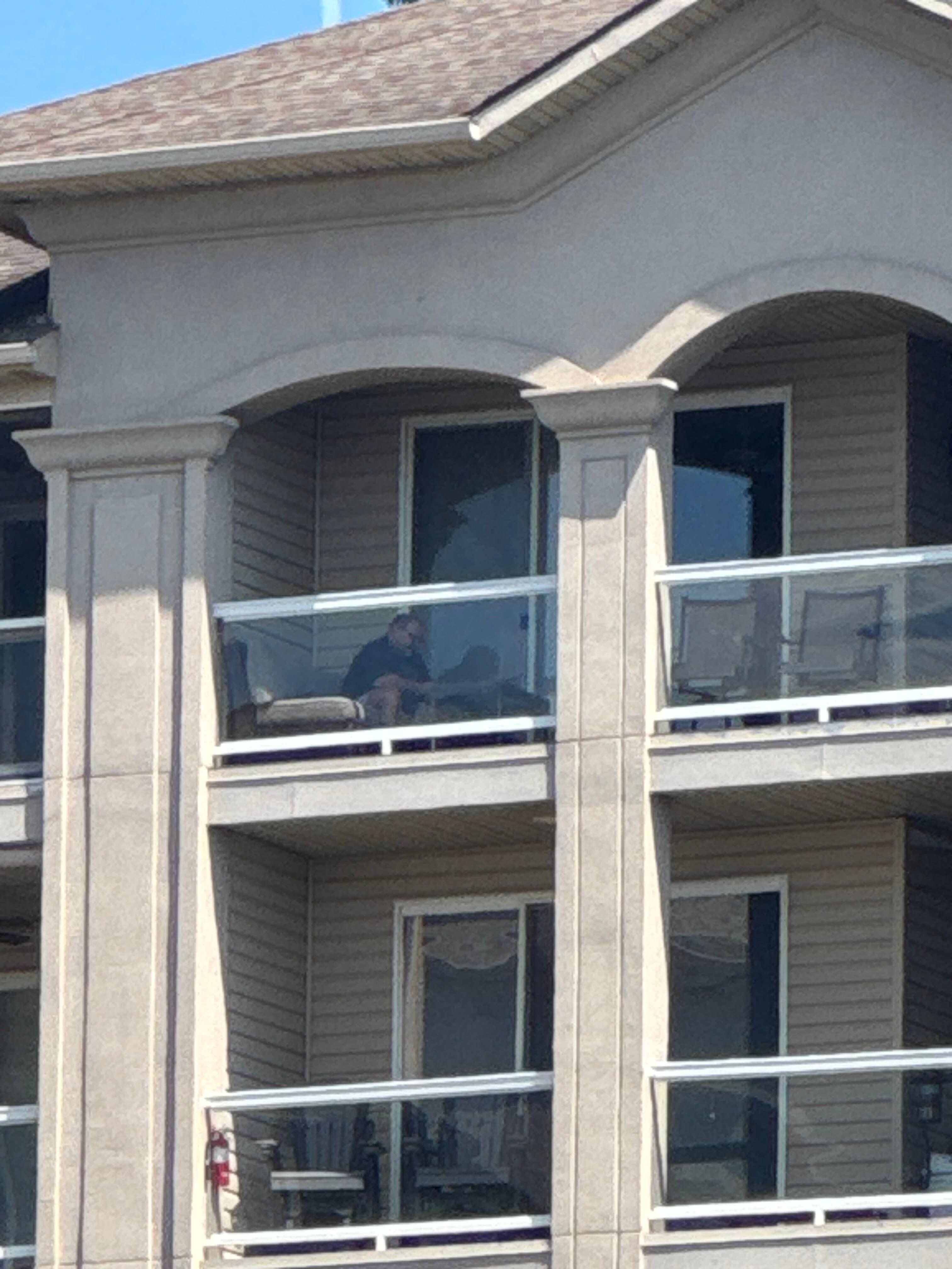 Even the husband enjoyed the balcony. 