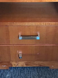 Broken furniture, the other drawers fell out as you opened them.