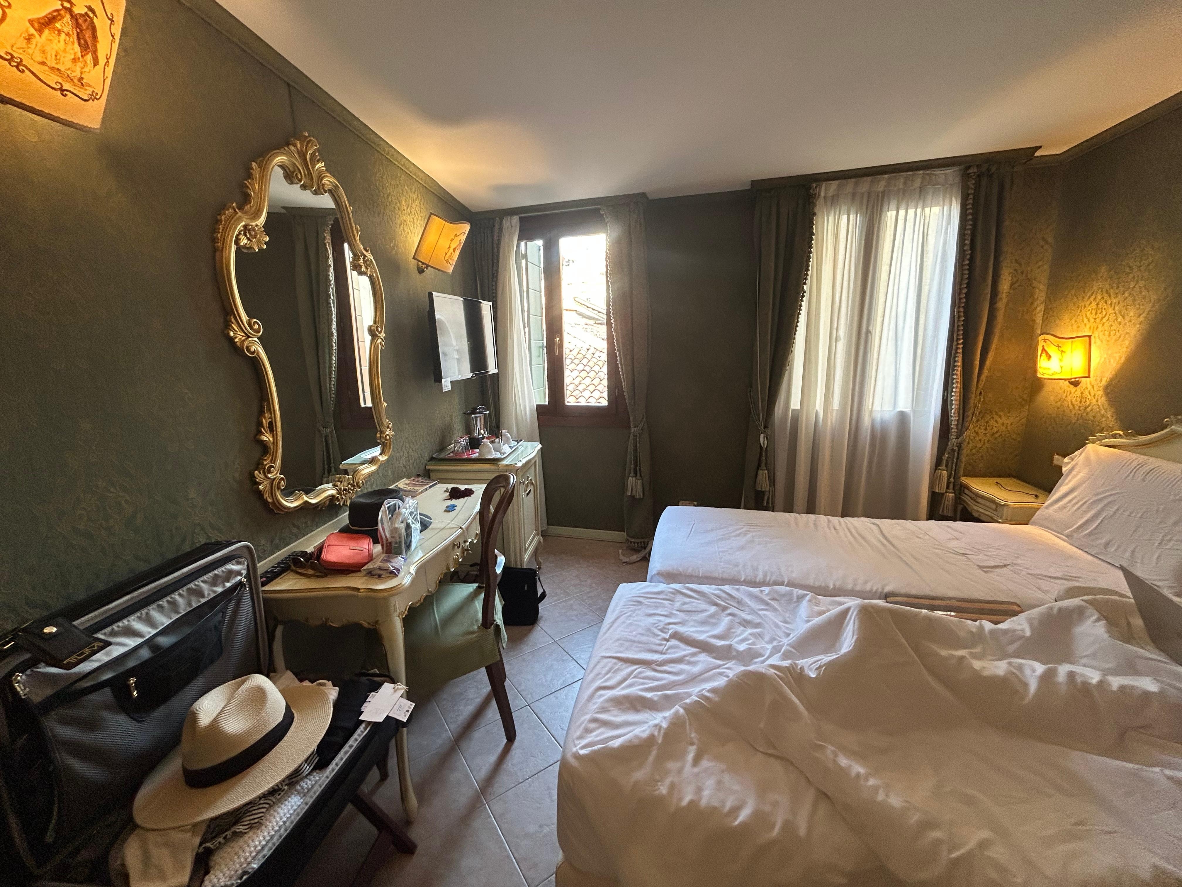 Room 307
Fabric wall covering and canal view