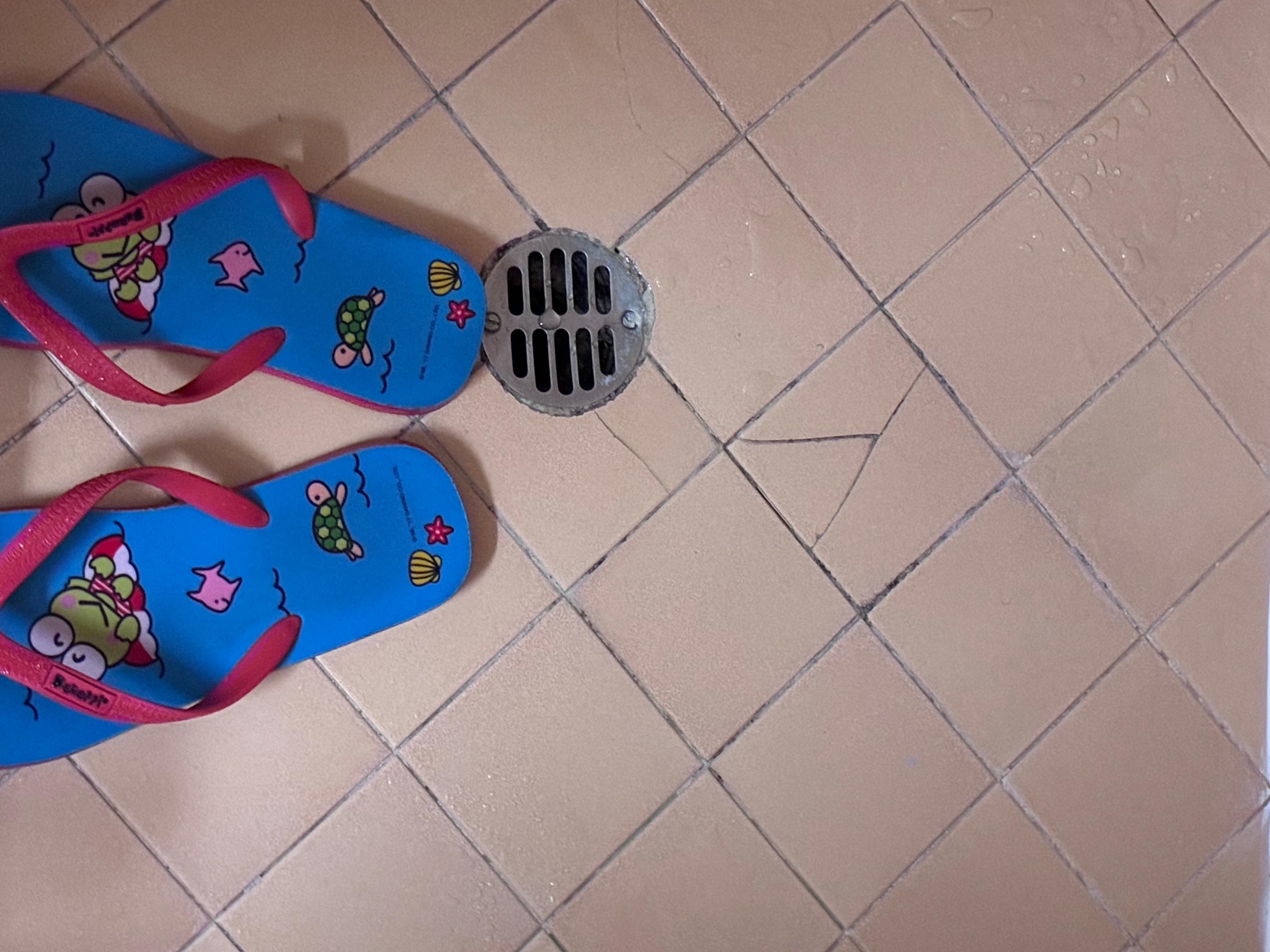 Unclean shower. Flip flops preferably. 