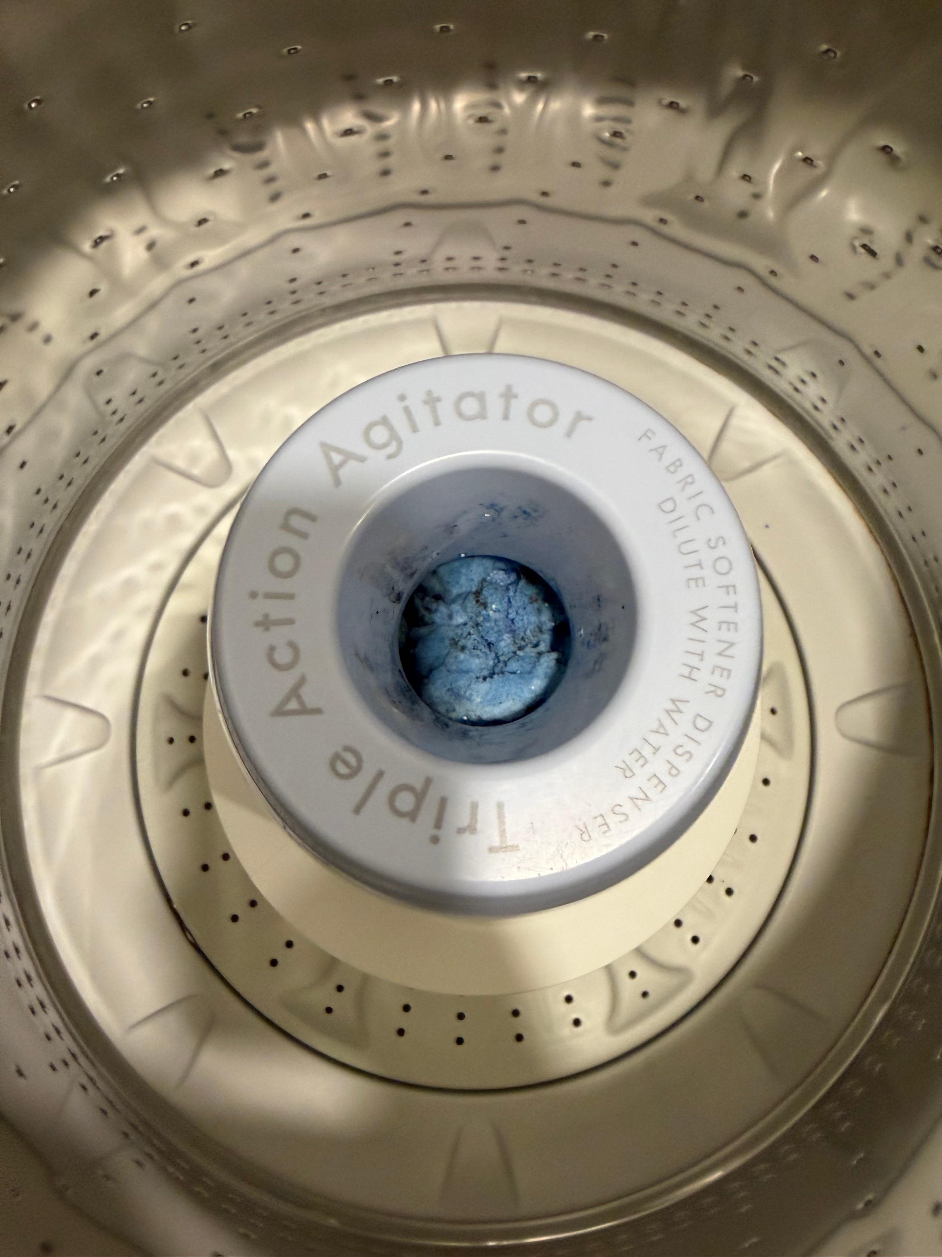 This is the caked in fabric softner smell. They are putting pods in the drawer instead of the drum on the upstairs machine