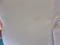 Stains on the sheets.