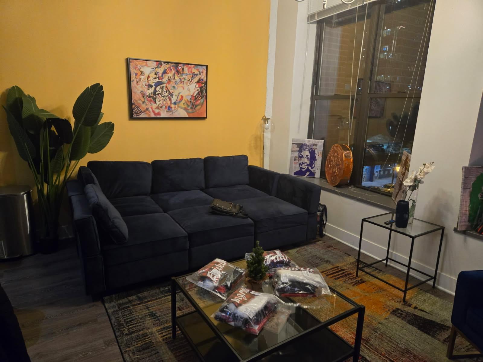Seating area in the main living space. There is a pit sofa.