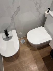 The bathroom layout was poorly planned. The placement of the bathroom furniture made it almost unusable and very impractical.