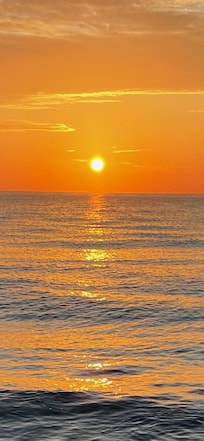 Sunrise on 3/19/23 from the beach at Oceans Beach Resort. Amazing!