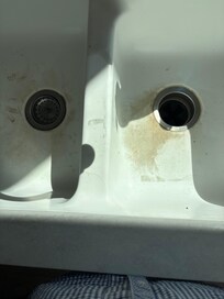 Kitchen sink needs repair.