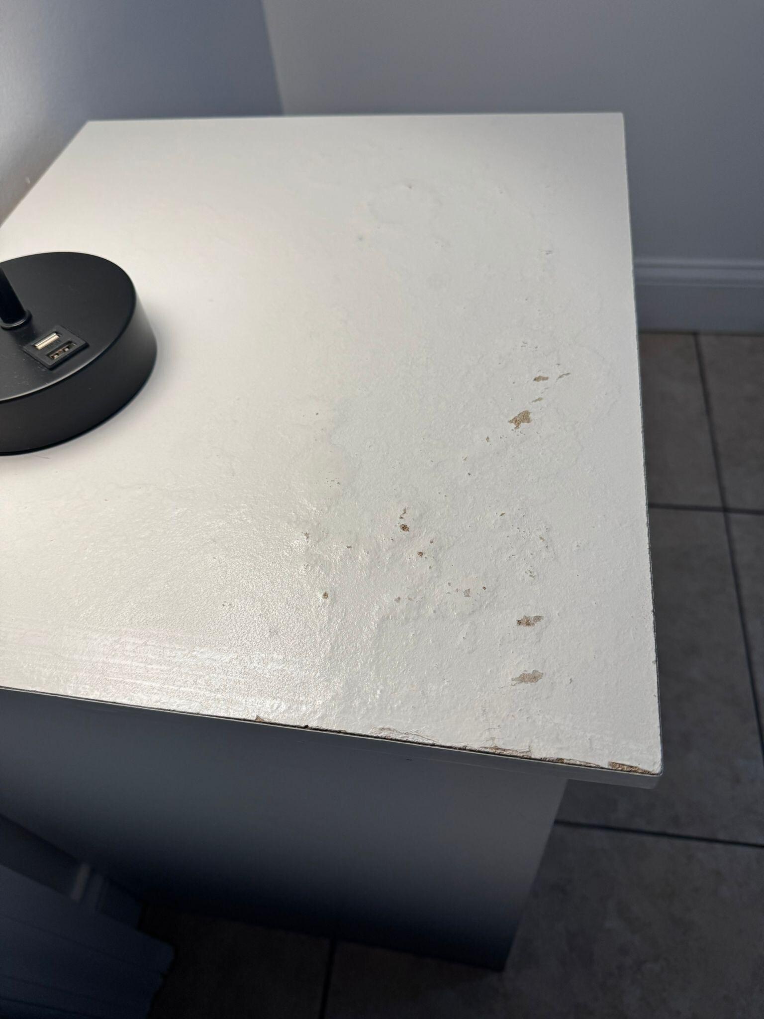 Damaged and moldy nightstand 