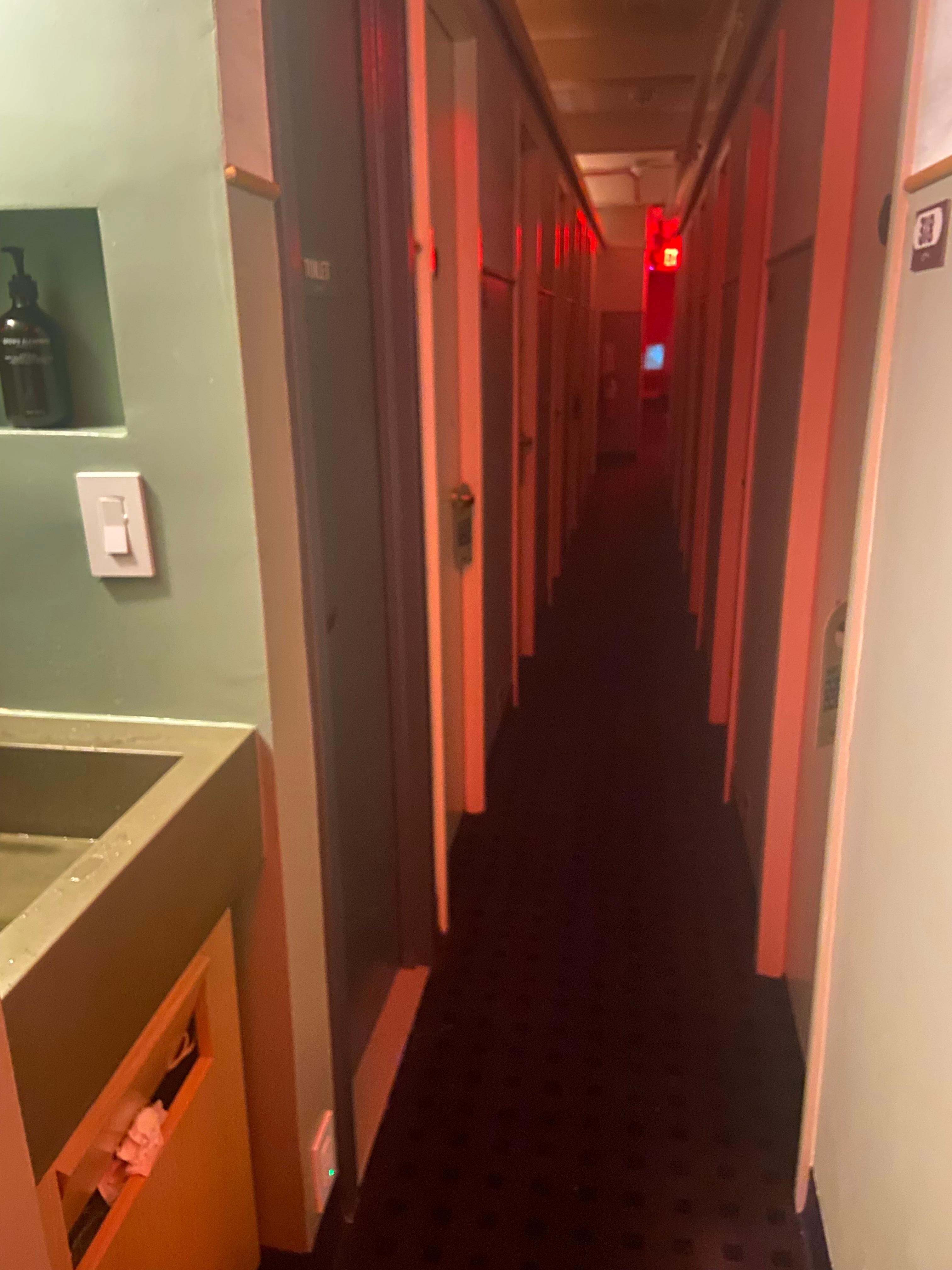 Sink and hallway - think “sleeping train passageway”