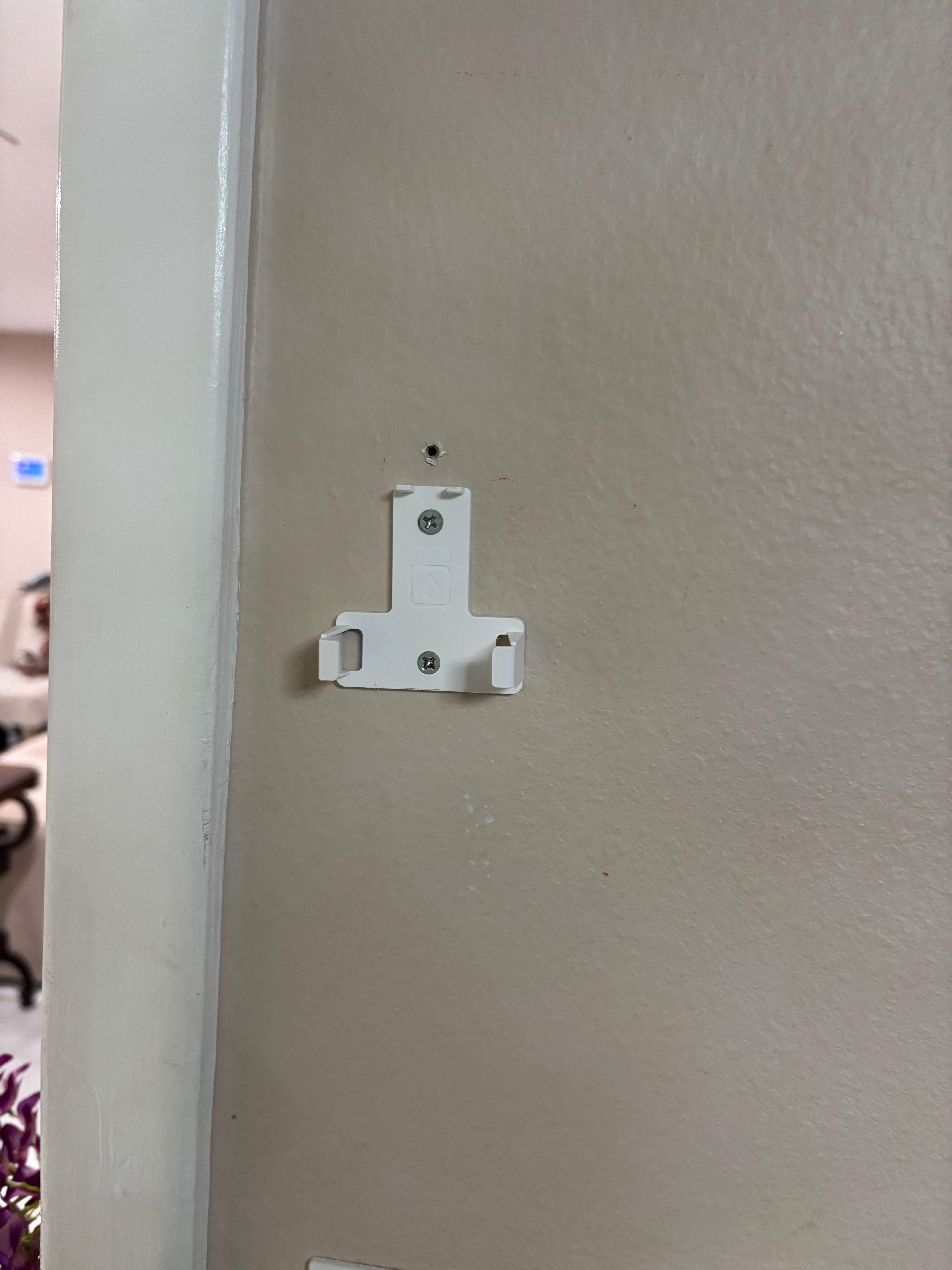 This remote hanger for the lights is upside down.