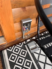 Cover off electrical box beside hot tub.