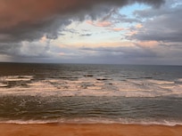 Views were constantly changing and we capture two Rainbows. with one rising out of the sea before us.