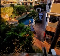 Overlooking the pool area from our spacious balcony.