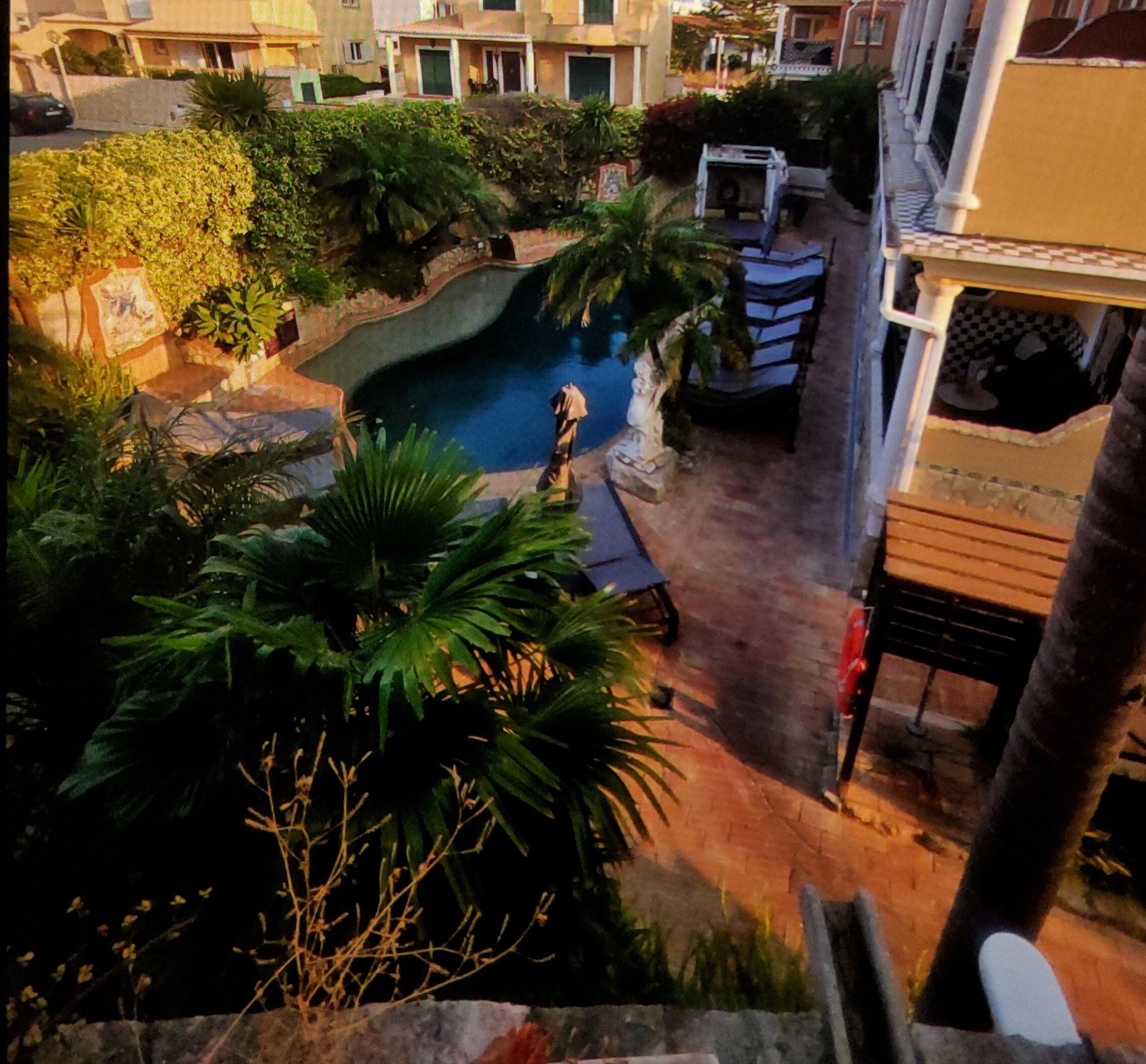 Overlooking the pool area from our spacious balcony.