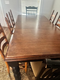 Family table right as you walk into the home from the center stairwell.