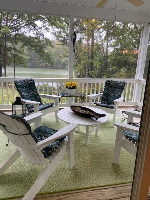Lovely screened in porch facing the water