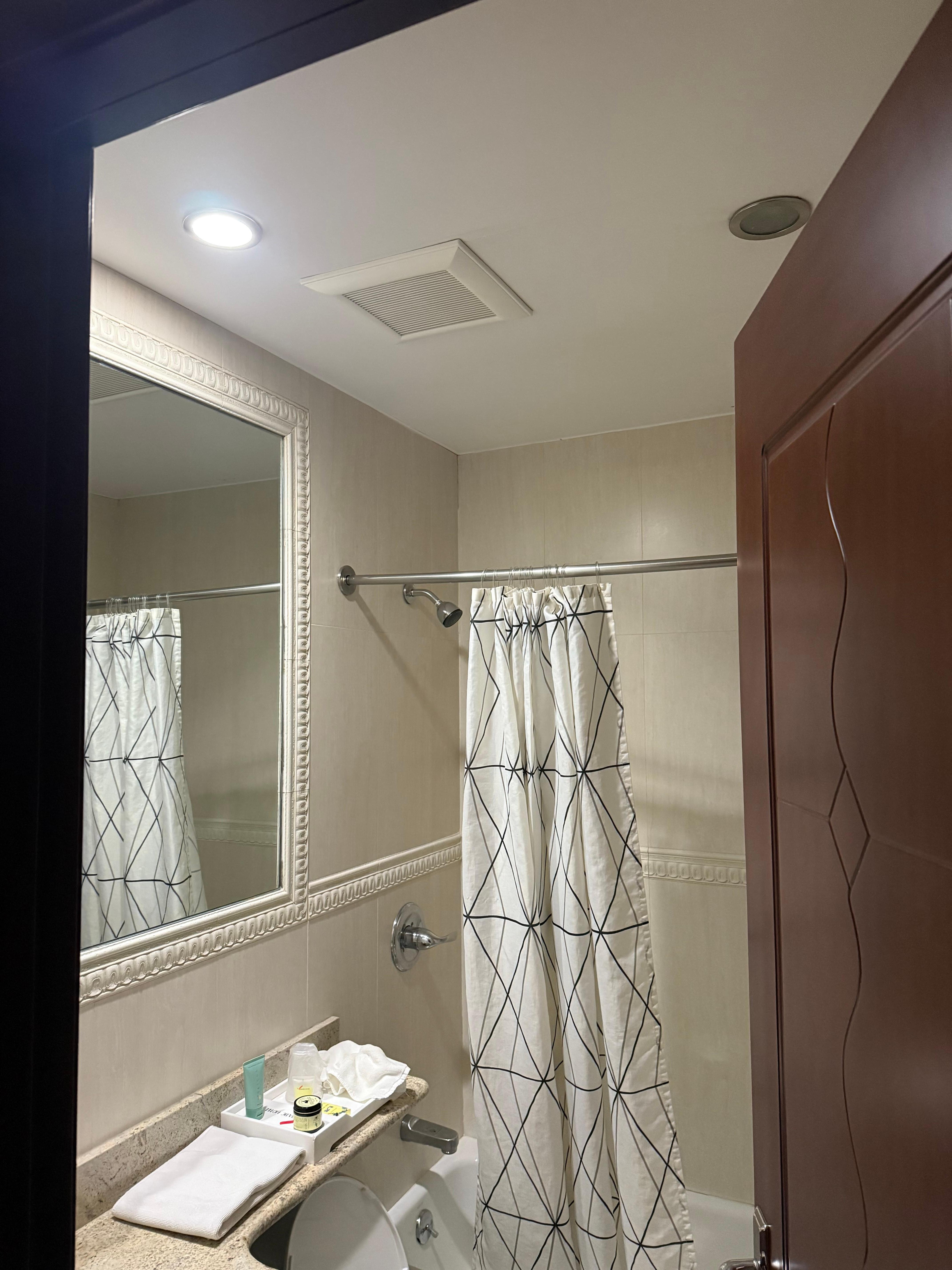 Bathroom vent where cigarette smoke came in from other room of smoker . 