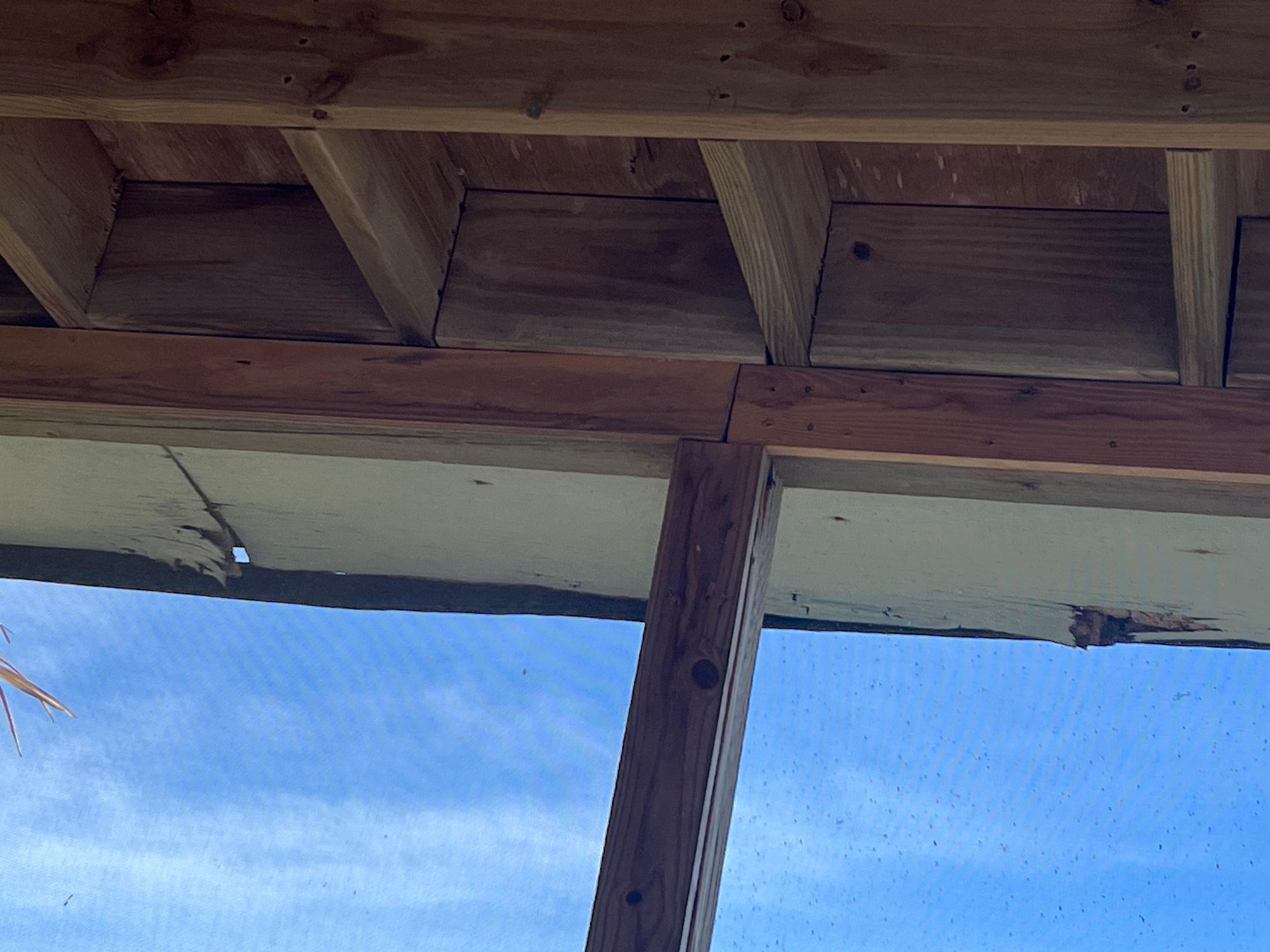 Soffits are rotten and falling down, deck above is unusable