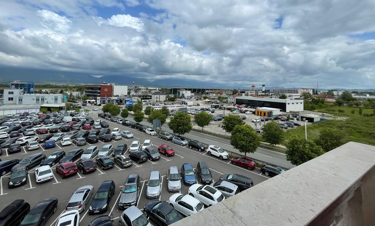 View of the long-term parking from the balcony with the control tower in the background 