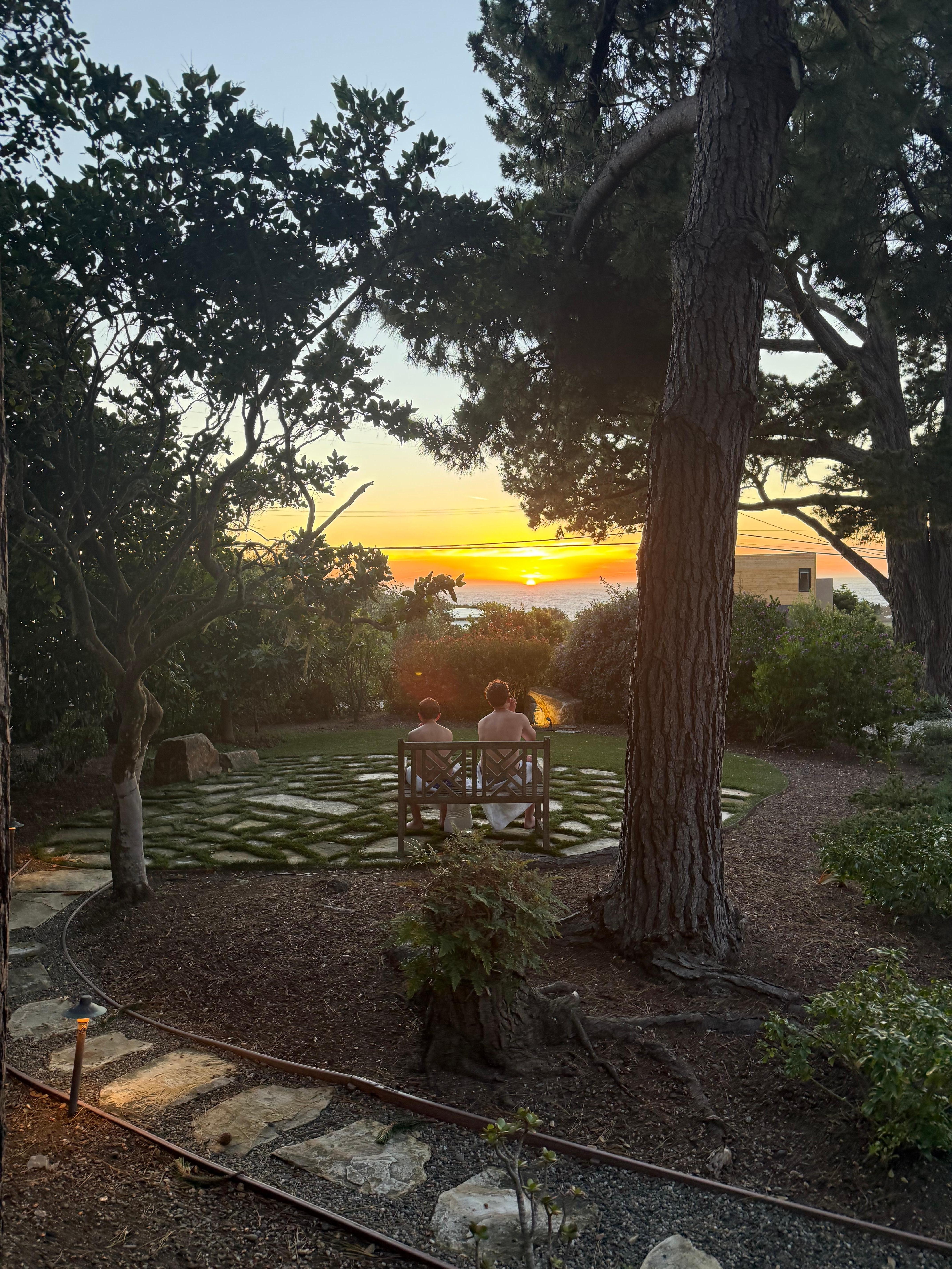 Our two sons watching the sun go down.