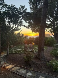 Our two sons watching the sun go down.