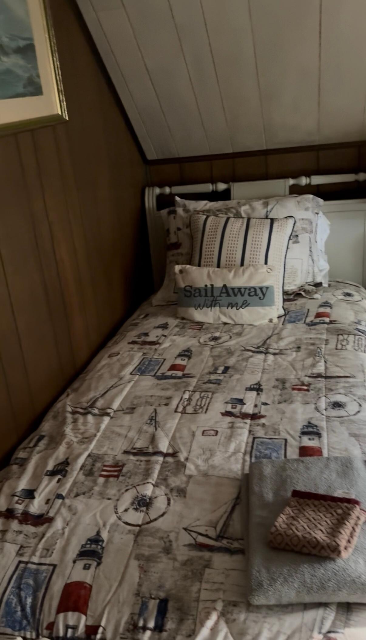 One of 3 twin-sized beds in upstairs bedroom