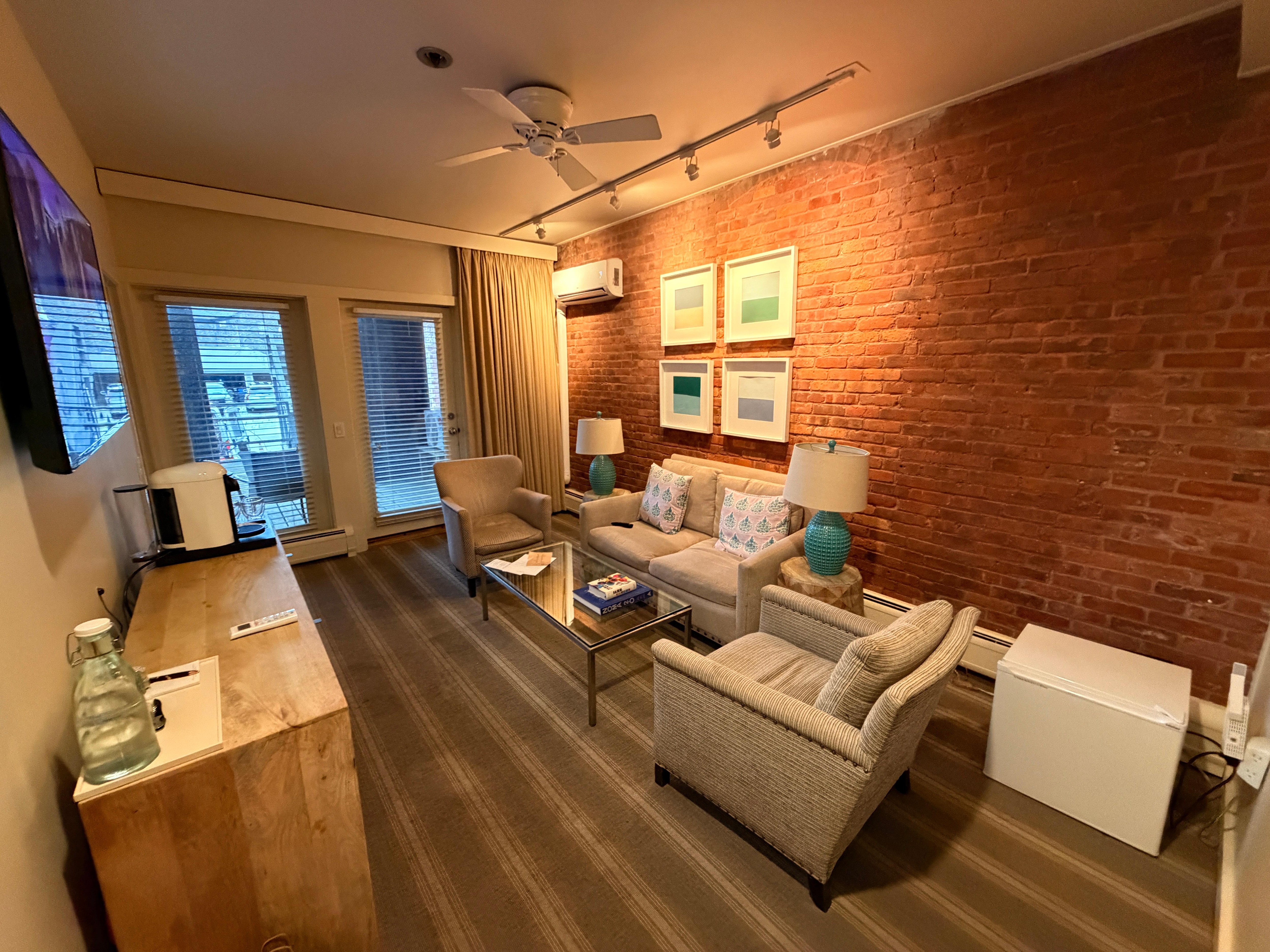 Amazing sitting room as you walk in.  with the door to the private porch. 