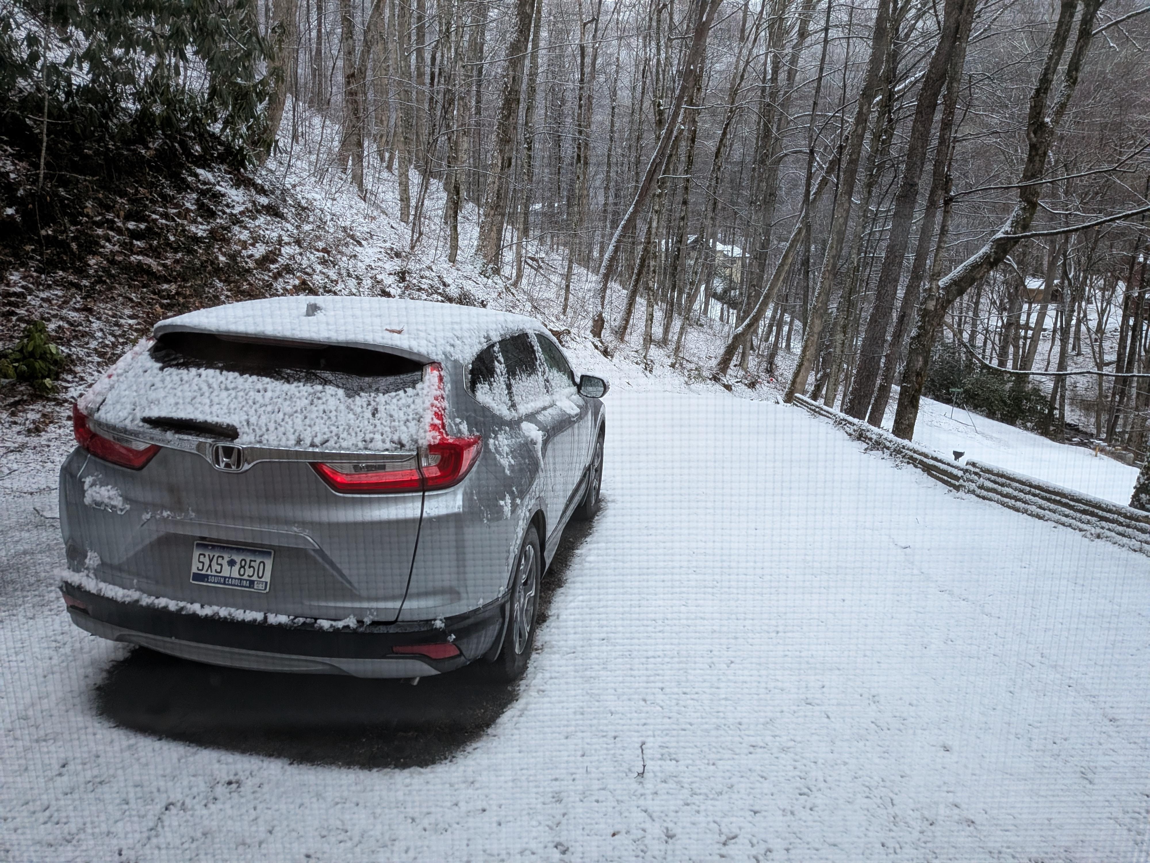 Drive is steep but accessible by a car. 