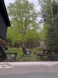 From the hot tub, looking to the fire pit and backyard. Awesome!